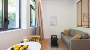 Apartamento, vista para o jardim | Área de estar