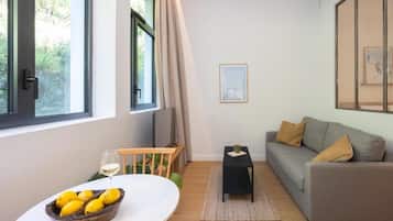 Appartement, uitzicht op tuin | Woonruimte
