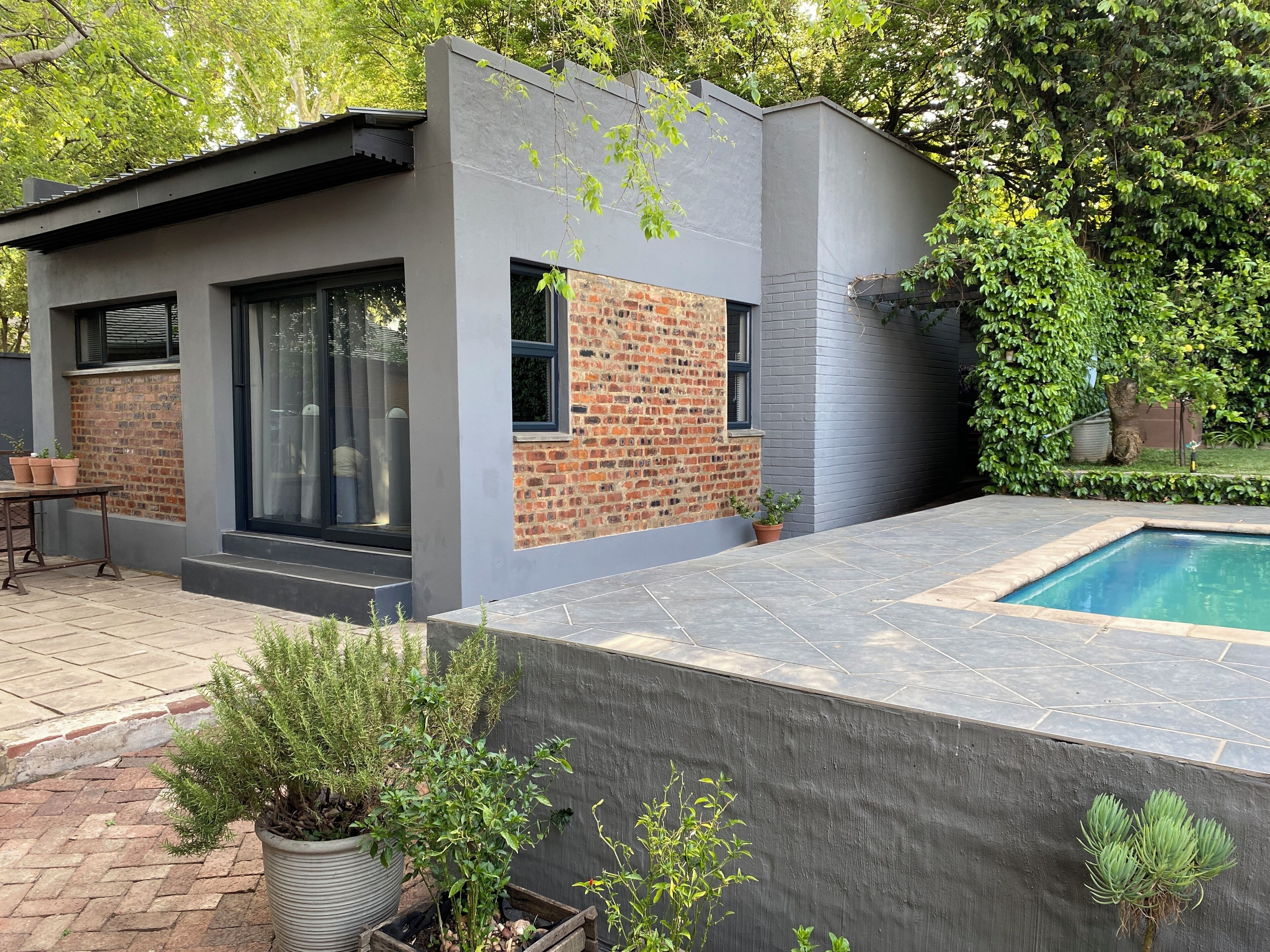 Seasonal outdoor pool, open 6:30 AM to 8:00 PM, pool umbrellas
