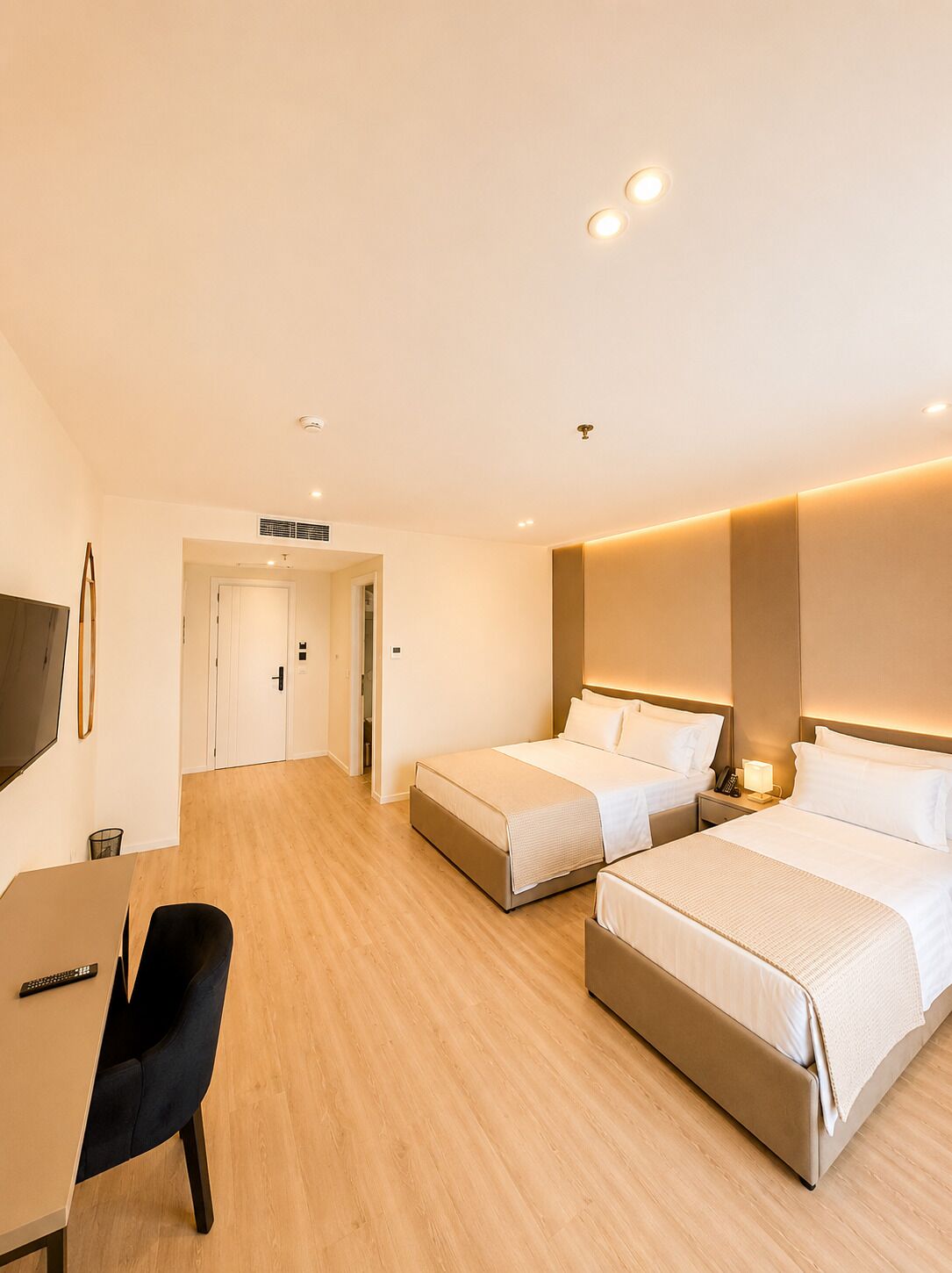 Superior Triple Room, Balcony | In-room safe, desk, laptop workspace, blackout drapes
