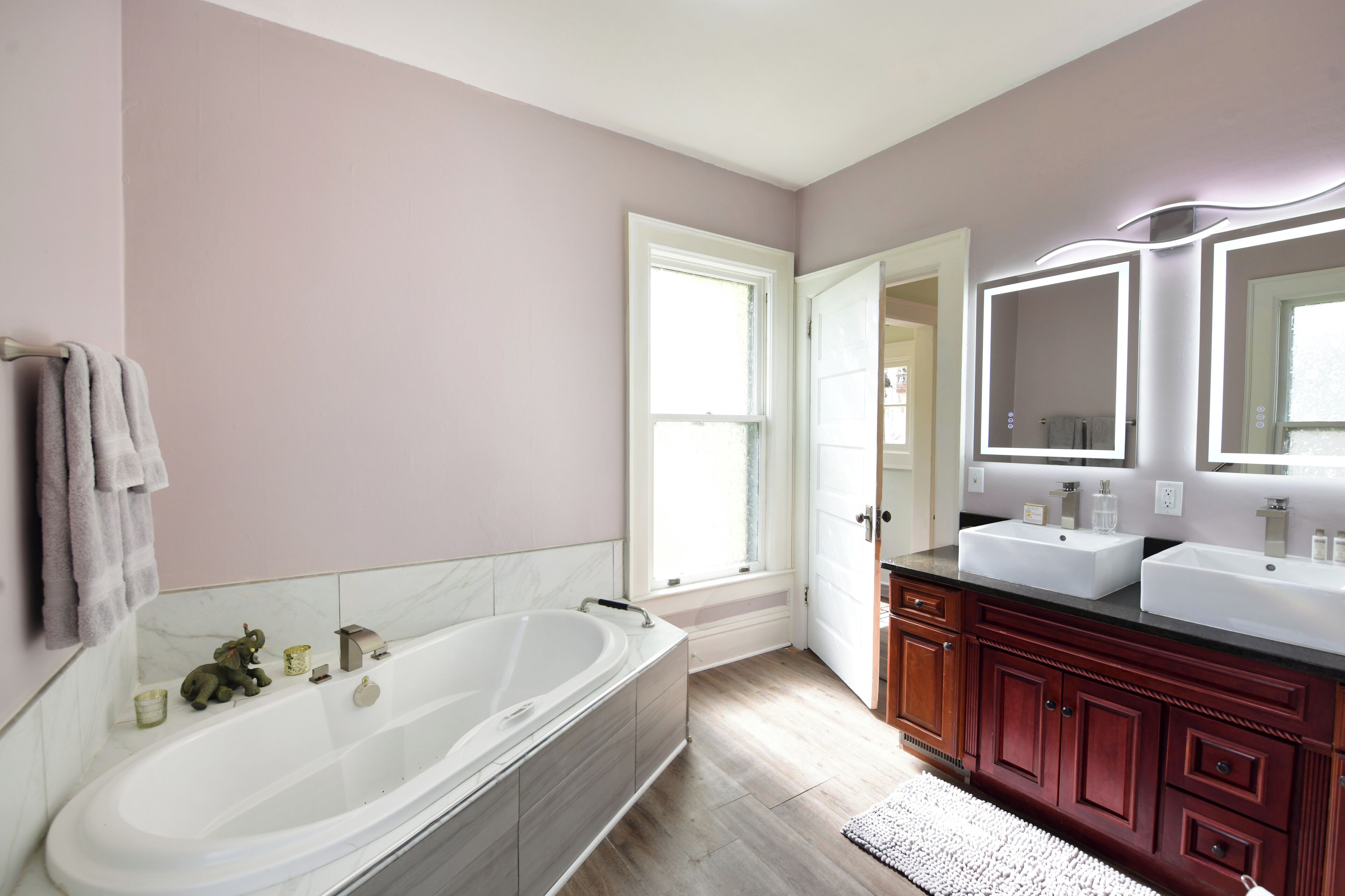 Shower, jetted tub, hair dryer, towels