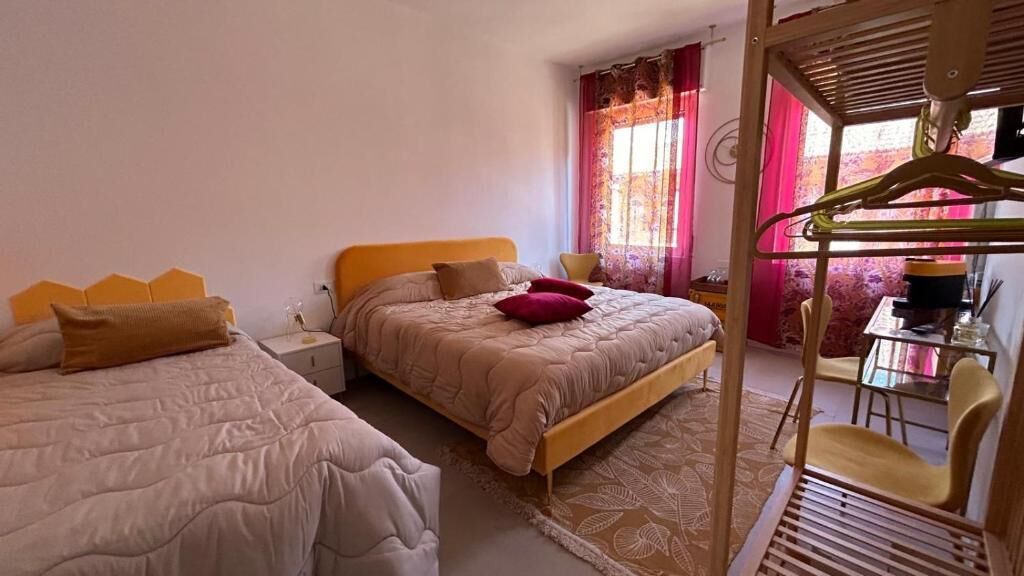 Suite Deluxe, 2 camere da letto, balcone, vista cortile | Ferro/asse da stiro, Wi-Fi gratuito