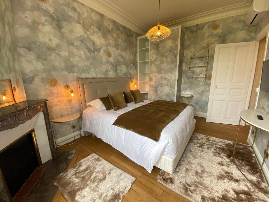 Chambre Deluxe double | Rideaux d’obscurcissement, fer et planche à repasser