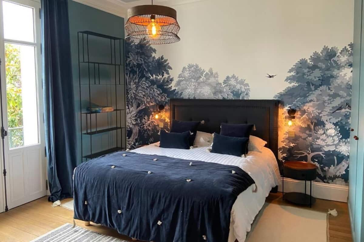 Chambre Deluxe double, vue sur le jardin | Rideaux dâobscurcissement, fer et planche Ă repasser
