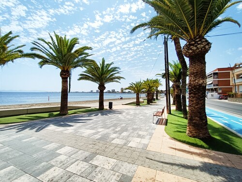 Sea-view frontline apartment with balcony