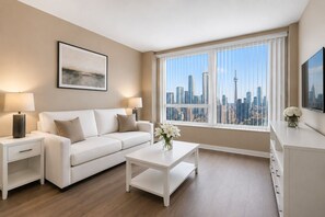 Economy Room | Living area - Noma Urban Suites (Toronto)