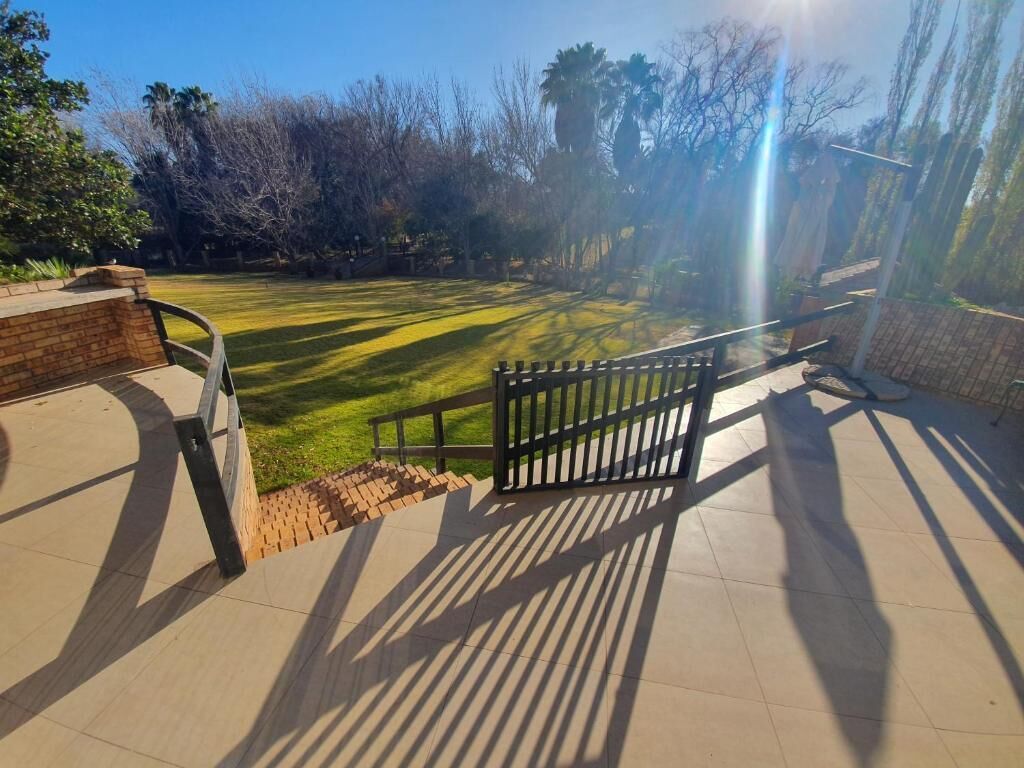 Executive Suite, Balcony, Garden View | Property grounds