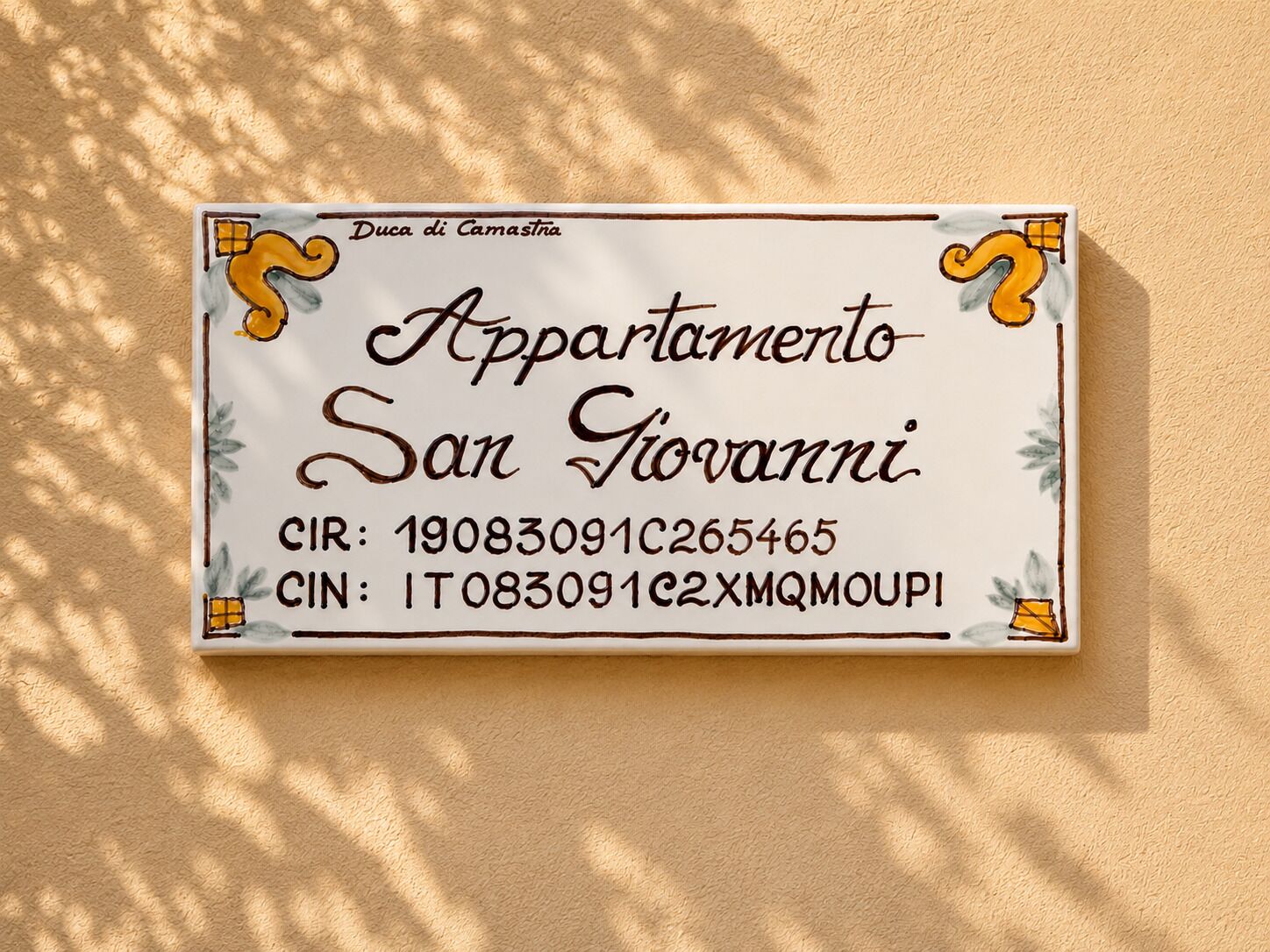 A business card for 'Appartamento San Giovanni' with contact details.
