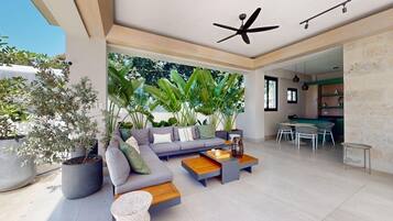 Luxury Apartment, Balcony, Pool View | Outdoor dining