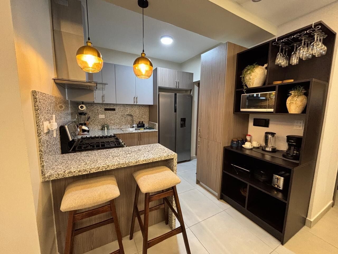 Luxury Apartment, Balcony, Pool View | Private kitchen | Fridge, microwave, oven, stovetop