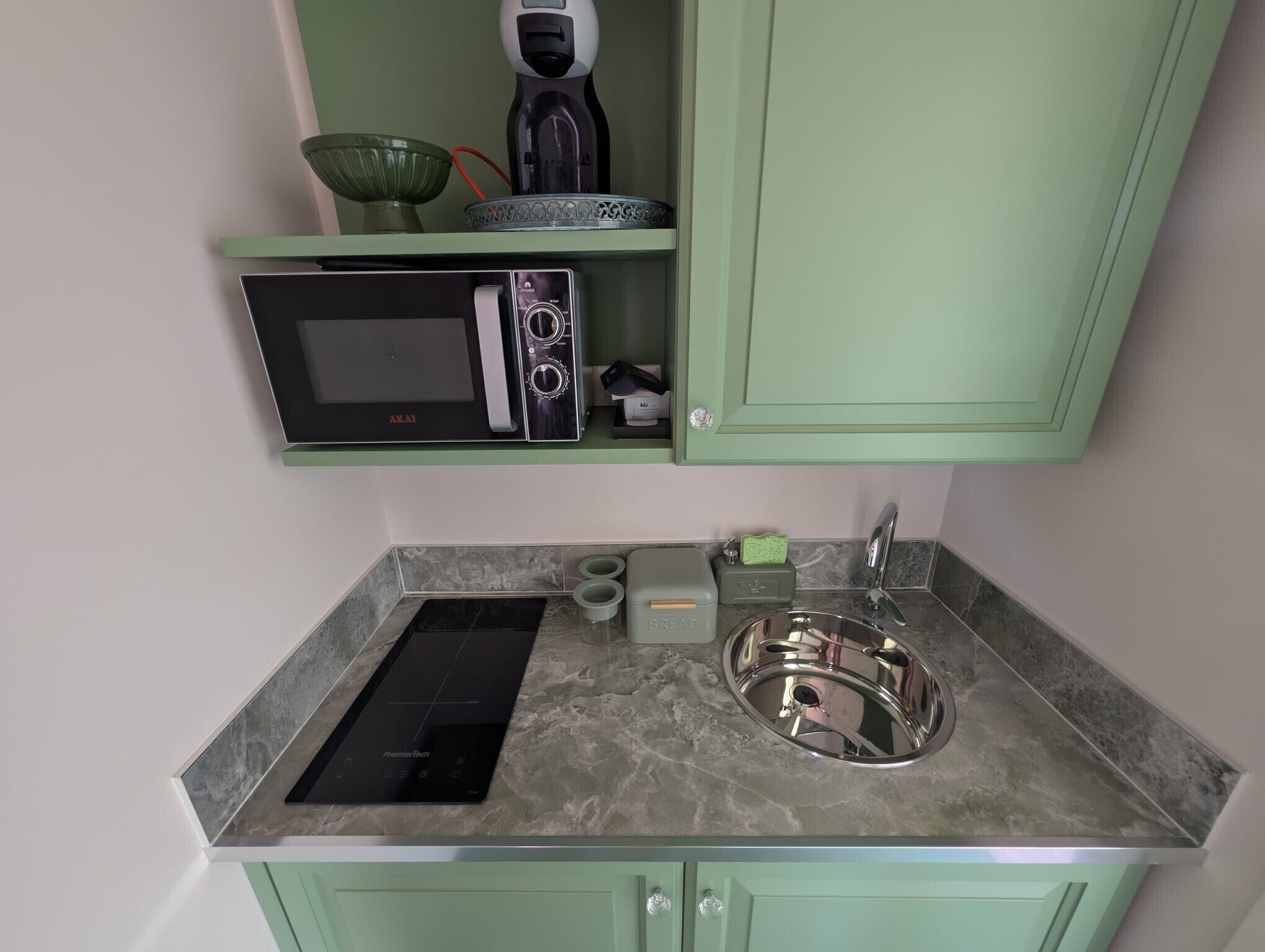 Fridge, microwave, stovetop, coffee/tea maker