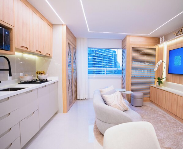 Deluxe appartement, uitzicht op park | Woonruimte