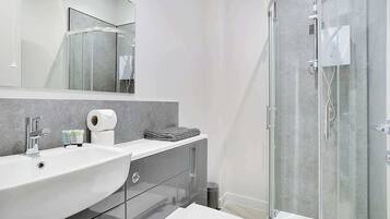 Shower, hair dryer, shampoo