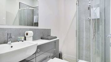 Shower, hair dryer, shampoo