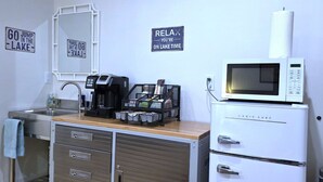 A kitchenette with a coffee maker, microwave, and storage drawers. - Private, Modern Casita, Coffee Bar, Wet Bar (Page)