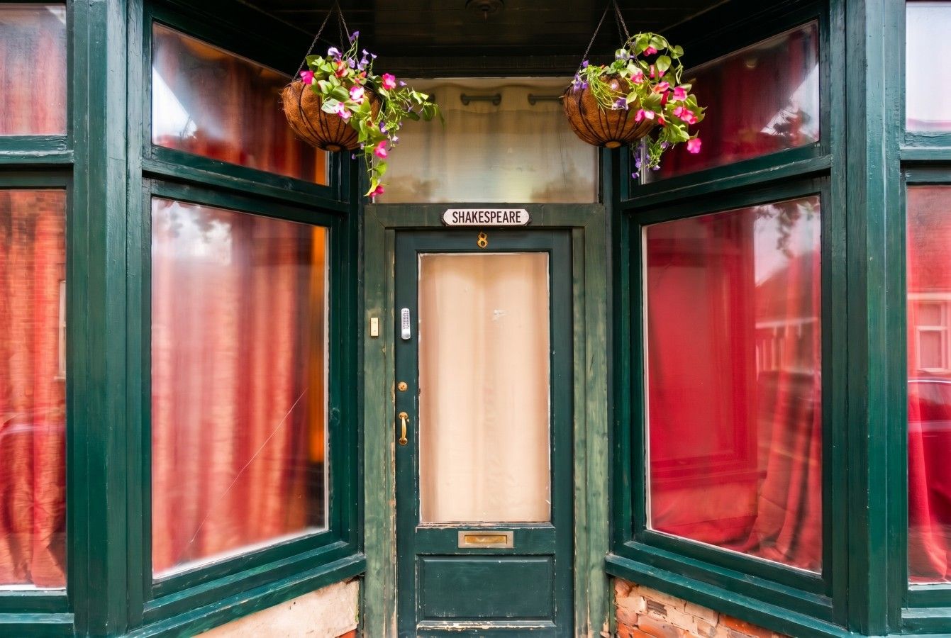 Vintage Shakespeare front door with 24-hour keypad access.