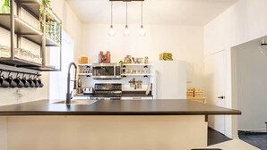 Coffee/tea maker, fridge, microwave, oven