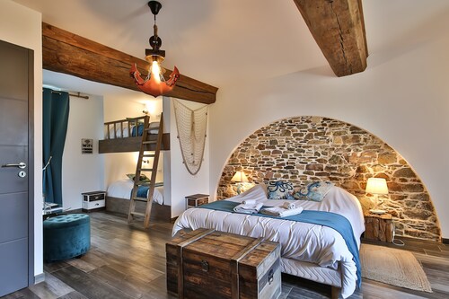 Chambre Black Pearl - ambiance marine avec jardin partagé
