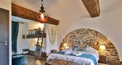 Chambre Black Pearl - ambiance marine avec jardin partagé