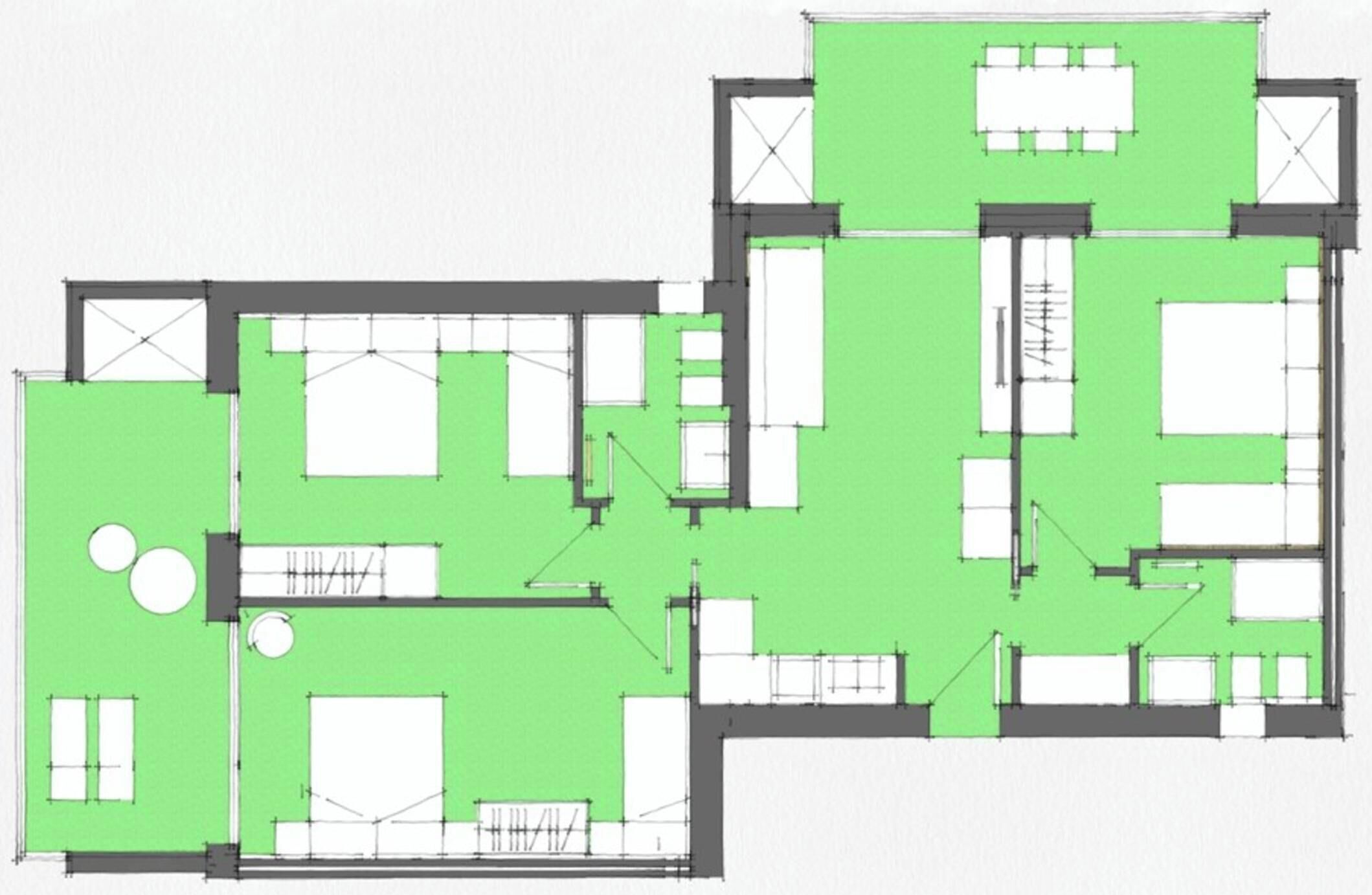 A floor plan with multiple rooms, a central hallway, and a dining area.