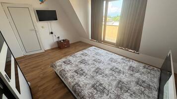 Apartemen | 1 kamar tidur, Wi-Fi gratis, dan seprai linen