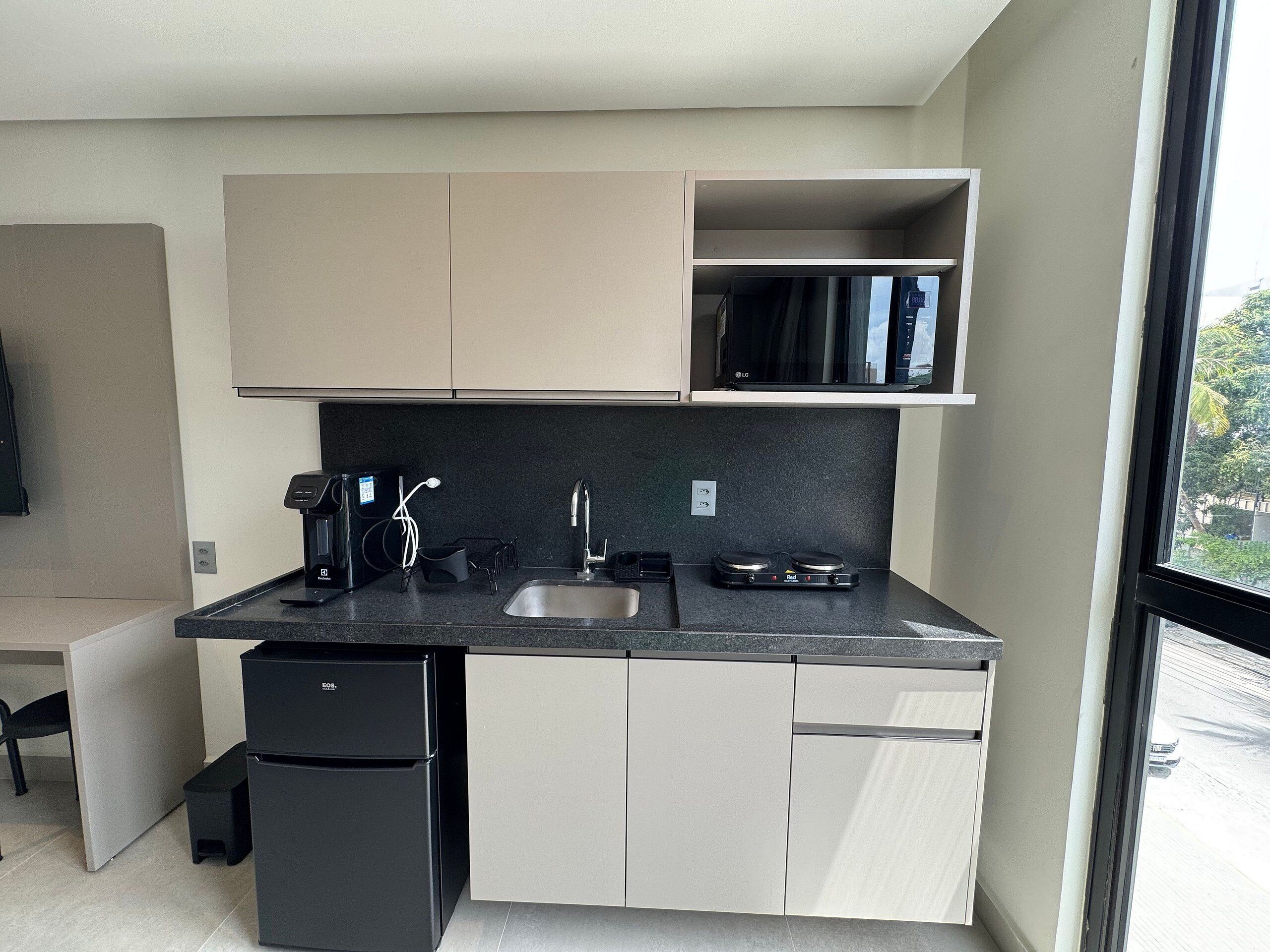 Coffee/tea maker, fridge, microwave, toaster