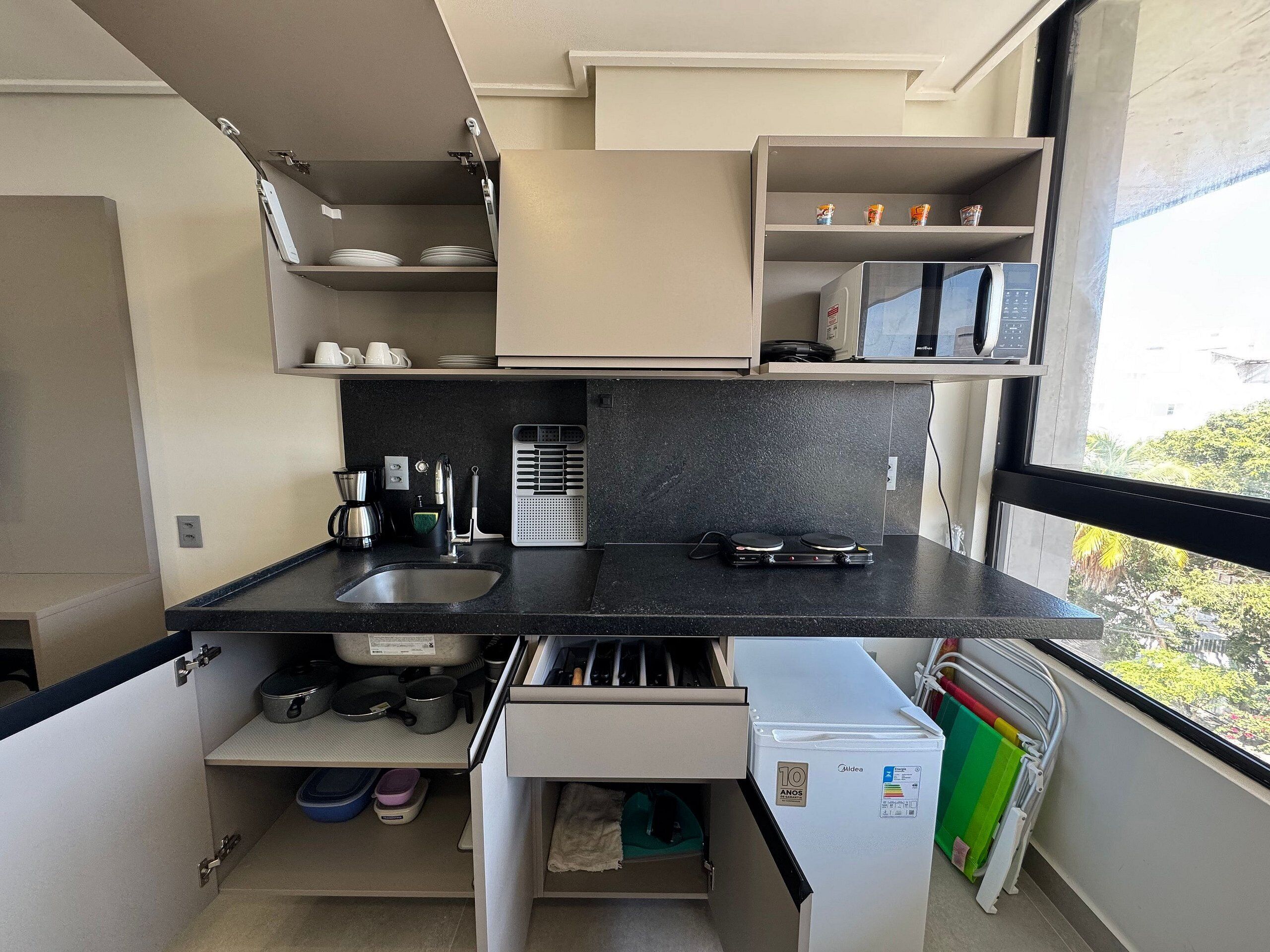 Coffee/tea maker, fridge, microwave, toaster