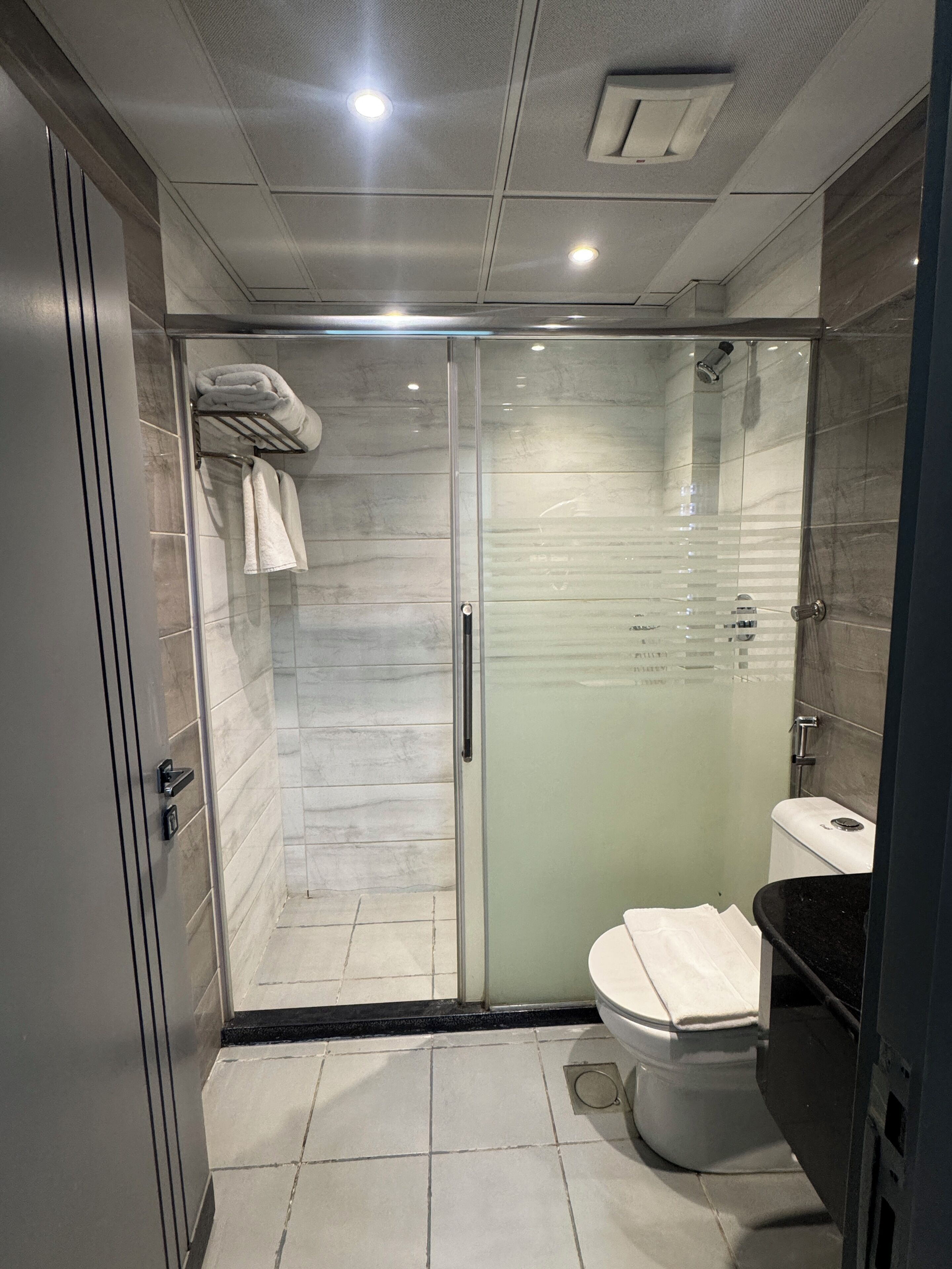 Rainfall showerhead, free toiletries, hair dryer, slippers
