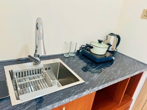 Studio Suite, Balcony, Hill View | Private kitchen | Fridge - Namca Hotel  (Phuquoc)