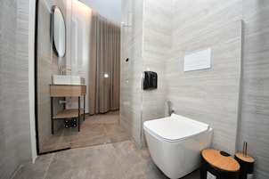 Deluxe Twin Room, City View | Bathroom | Shower, hair dryer, slippers, towels