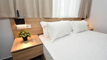 Superior Double Room, City View | Desk, laptop workspace, soundproofing, iron/ironing board