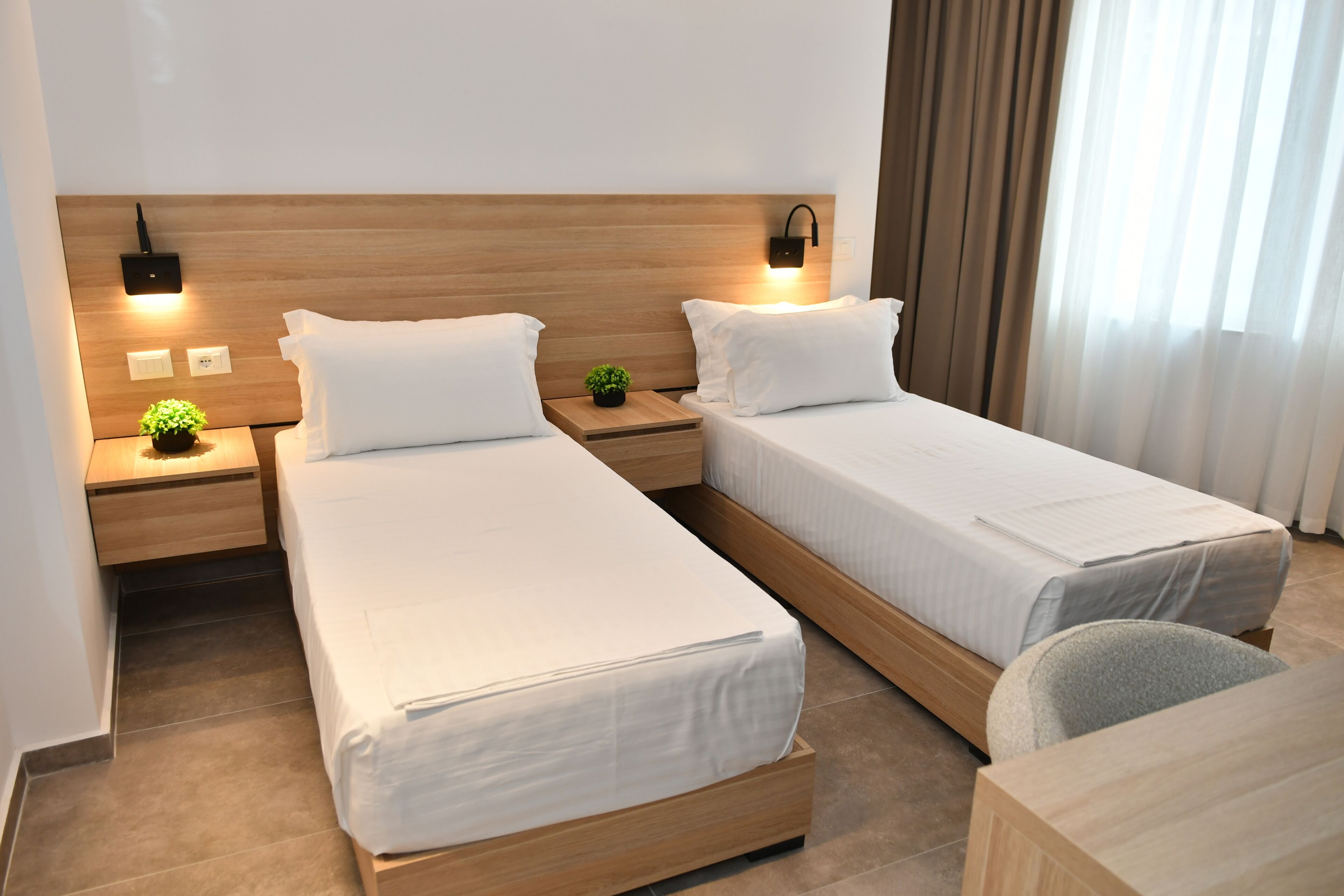 Deluxe Twin Room, City View | Desk, laptop workspace, soundproofing, iron/ironing board