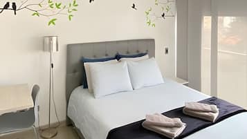 Apartamento | Cortinas opacas, tabla de planchar con plancha, wifi gratis
