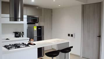 Apartamento, vista para a cidade | Cozinha privada
