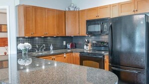 Fridge, microwave, oven, stovetop - Sunset Retreat - Pool, Hot Tub & Golf (2306) (Kelowna)