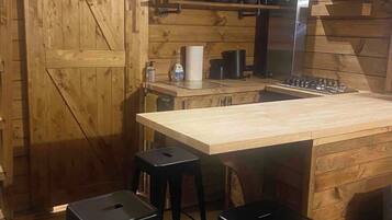 Fridge, microwave, stovetop, coffee/tea maker