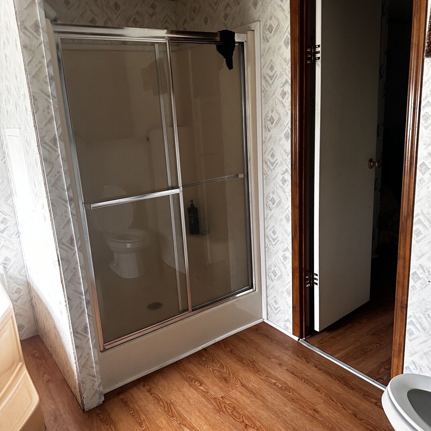 Shower, towels, soap, toilet paper