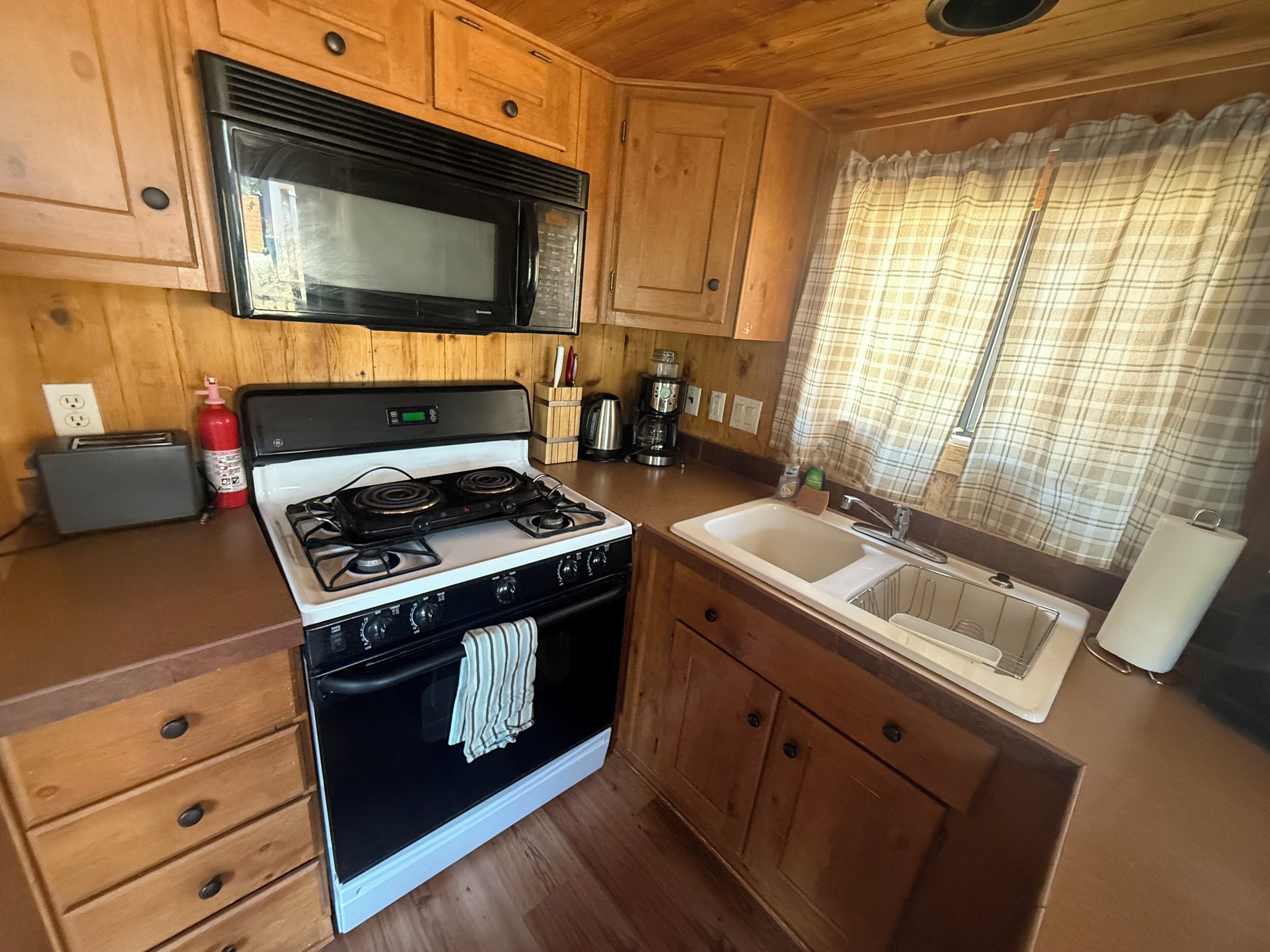 Fridge, microwave, coffee/tea maker, toaster