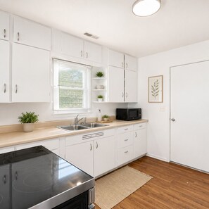 Fridge, microwave, oven, stovetop - Explore the Black Hills from This Cozy 2BR Stay (Rapid City)