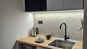 Superior Triple Room, Balcony, City View | Private kitchenette | Mini-fridge, microwave, espresso maker, electric kettle