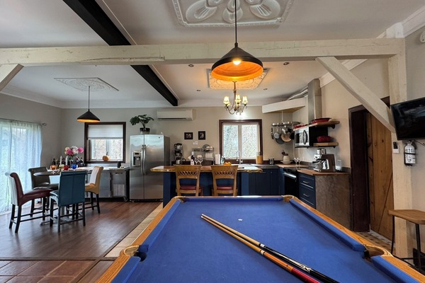 Lower unit suite, equipped with Studio Kitchen and Pool table.