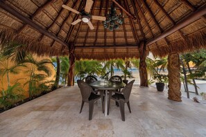 Outdoor dining - Quinta Ixchel -Luxury Sac Bajo Beachfront Villas - Private Beach, Pool & Dock (Isla Mujeres)