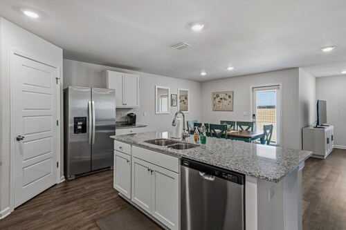 Brand New 4BR House w/ Patio | Centrally Located!