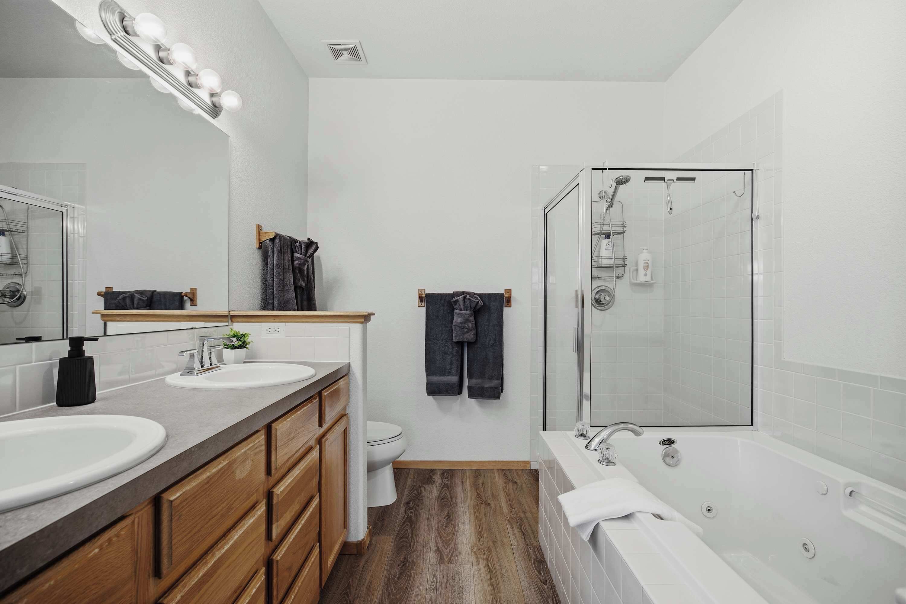 Shower, hair dryer, towels, shampoo