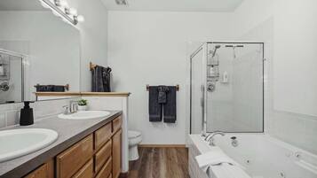 Shower, hair dryer, towels, shampoo