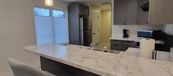 Cozy 1-bedroom duplex in Greenfield with AC.