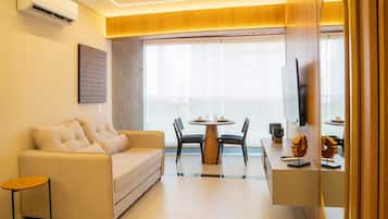Comfort Apartment | Living area | 43-inch Smart TV with digital channels, Netflix, streaming services