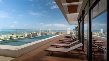 Classic Apartment | Pool | 15 outdoor pools, open 5:00 AM to midnight, pool loungers