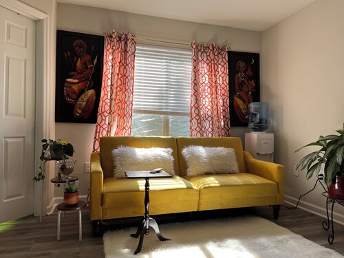 Cozy 1-bedroom apartment in Savannah with workstation and workout equipment