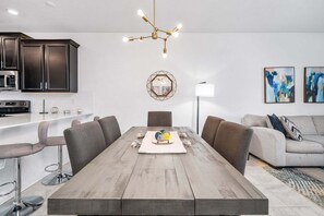 Townhome, Multiple Beds, Pool Access, Pool View (CHG106-1081-3) | Dining - Spacious 3BR Home in Champions Gate Near Disney (Davenport)